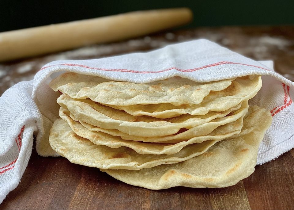 Flour tortillas wrapped in a white towell