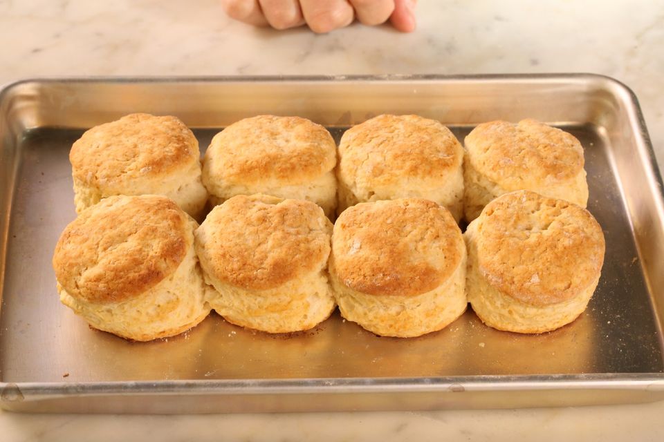 Eight biscuits on a baking tray